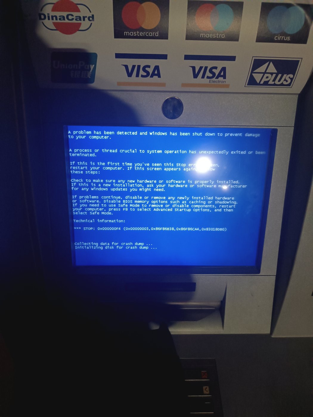 A public display showing a Windows error screen